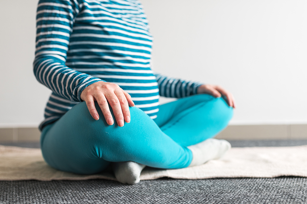 yoga pose in pregnancy class - Elements of Birth Berlin.