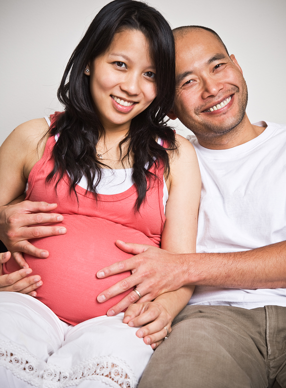 pregnant woman and partner attending an online birth preparation class