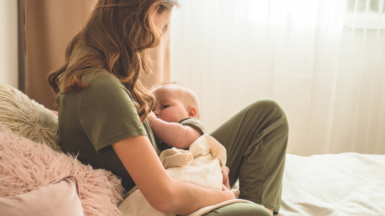 1733576762967 Picture of mother and breastfeeding baby